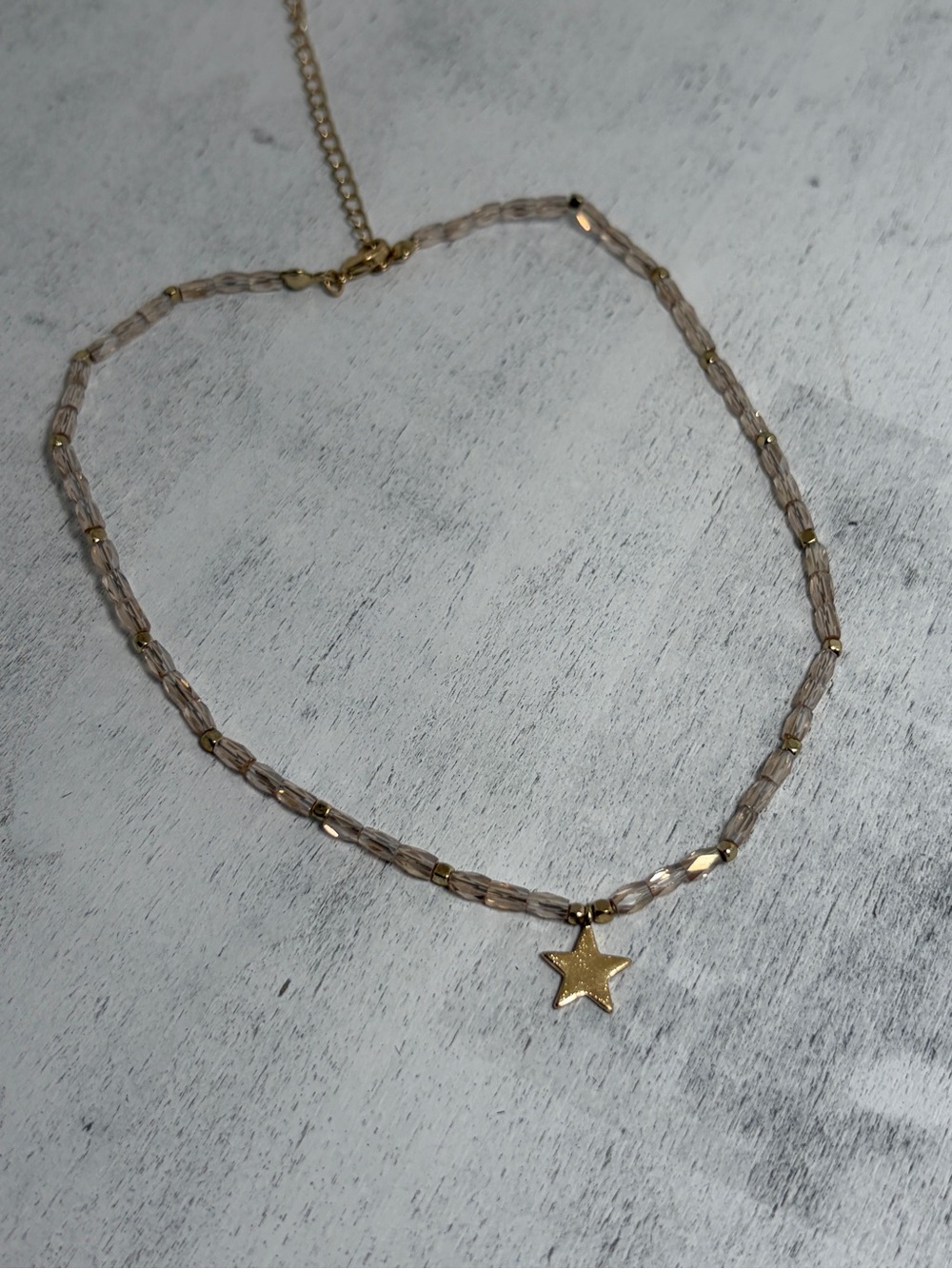 Delicate Beige Beaded Necklace with Gold Star Pendant